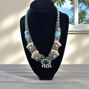 Elegant Silver Necklace with Pink and Blue Details